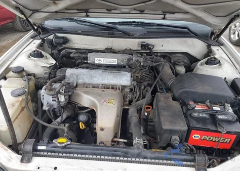 1993 Toyota Camry Le z USA, uszkodzony, nr VIN JT2SK12E8P0187069